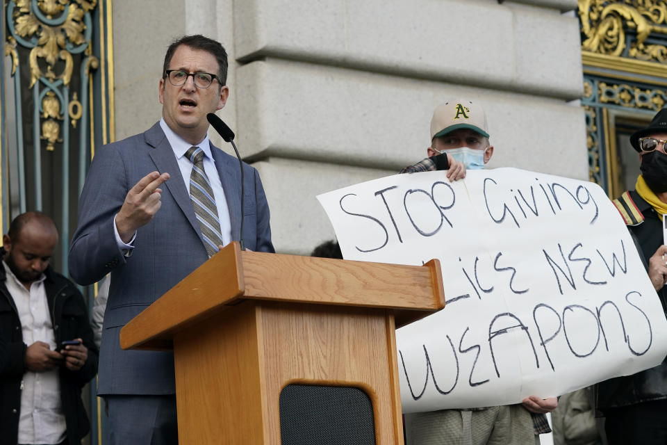 San Francisco Supervisor Dean Preston speaks at a demonstration about the use of robots by the San Francisco Police Department outside of City Hall in San Francisco, Monday, Dec. 5, 2022. The unabashedly liberal city of San Francisco became the unlikely proponent of weaponized police robots this week after supervisors approved limited use of the remote-controlled devices, addressing head-on an evolving technology that has become more widely available even if it is rarely deployed to confront suspects. (AP Photo/Jeff Chiu)