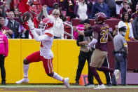 Kansas City Chiefs wide receiver Demarcus Robinson (11) celebrates his touchdown against Washington Football Team cornerback William Jackson (23) during the second half of an NFL football game, Sunday, Oct. 17, 2021, in Landover, Md. Chiefs won 31-13. (AP Photo/Alex Brandon)