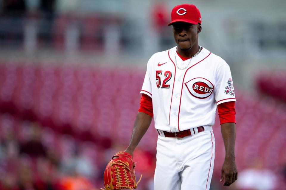 Cincinnati Reds starting pitcher Reiver Sanmartin (52) walks back to the dugout in the second inning of the MLB baseball game between Cincinnati Reds and San Diego Padres at Great American Ball Park in Cincinnati on Tuesday, April 26, 2022.