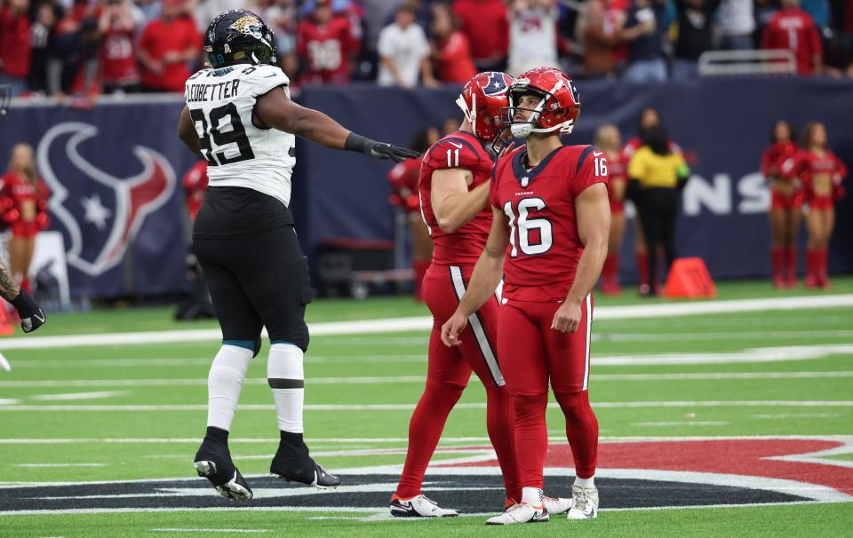 Jaguars defensive lineman Jeremiah Ledbetter signals no-good on Matt Ammendola's 58-yard field goal attempt at the end of Sunday's 24-21 victory for the Jaguars over the Texans.