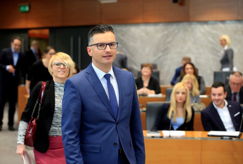 Slovenian Prime Minister Marjan Sarec arrives in the parliament after announcing his resignation, in Ljubljana