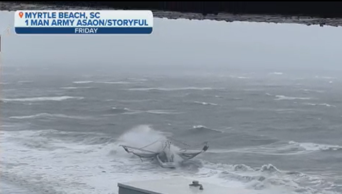 Residents in the high rises along Myrtle Beach got a bird's eye view of huge waves breaking over the fishing boat as it was pushed onshore.