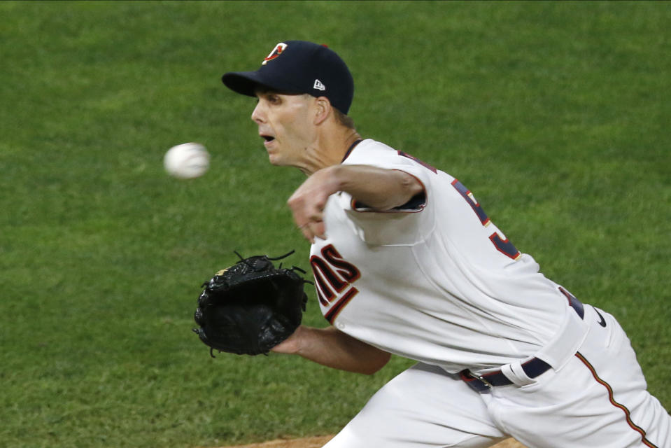 Minnesota Twins pitcher Taylor Rogers throws Pittsburgh Pirates in the ninth inning of a baseball game Monday, Aug. 3, 2020, in Minneapolis. The Twins won 5-4, with Rogers getting the win. (AP Photo/Jim Mone)