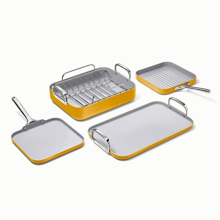 the square cookware set in a mustard yellow