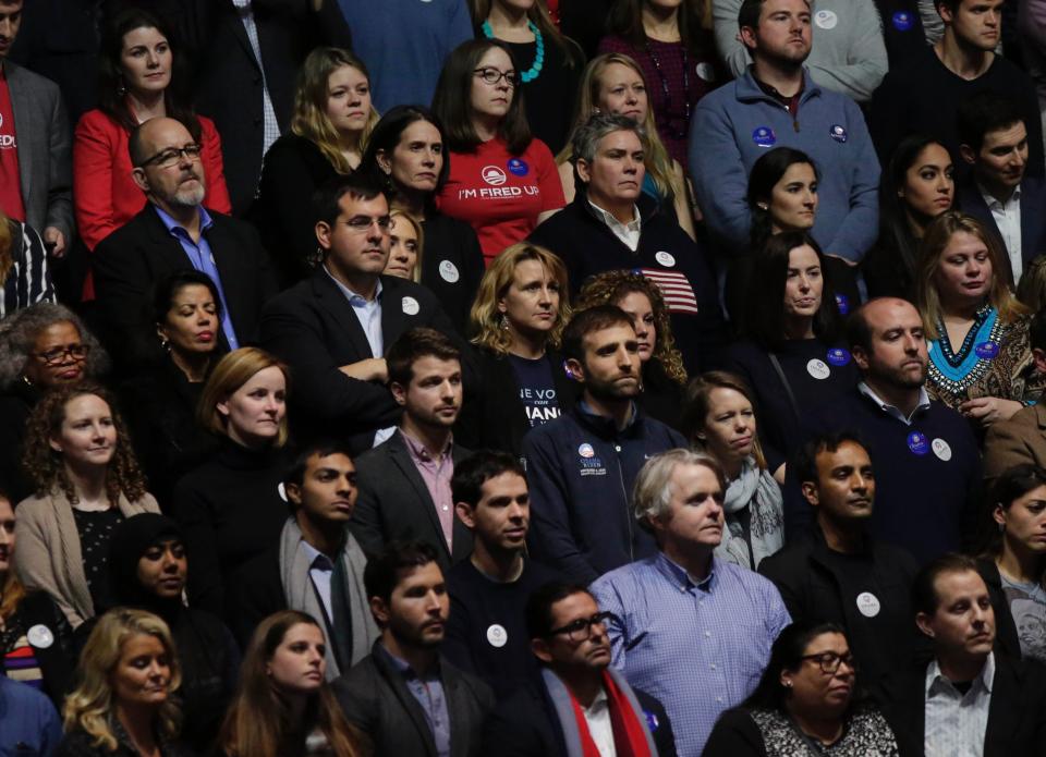 Supporters listen as Obama speaks.