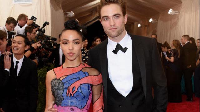 Robert Pattinson and his reported fiancee FKA Twigs sure know how to make an entrance. The adorable couple made their red carpet debut in style at the 2015 Met Gala, looking very much in love. Getty Images <strong>PHOTOS: The Stars' Best Looks at the 2015 Met Gala! </strong> But that's not all that turned heads -- look closely at FKA's leg, which appears to have a pink cartoon penis drawn on it. Seriously. Getty Images <strong>RELATED: Sarah Jessica Parker Rocks Giant, Flaming Headpiece at the 2015 Met Gala</strong> The 27-year-old British singer wore a Christopher Kane creation -- which is now sure to be one of the most talked-about dresses of the night -- while the 28-year-old Dior spokesman was dapper in a black-and-white suit. The event marks the first time the two have walked a red carpet together as a couple. In early April, T-Pain surprisingly let it slip that the couple was engaged in an interview with <em>Vulture</em>. Though he later claimed it was an April Fools' joke, <em> People</em> reported that the two were in fact taking the next step in their relationship, and FKA flashed what appears to be her engagement ring in a steamy Instagram shot by her stylist last week. Watch the happy couple dancing to Drake at Coachella last month in the video below!