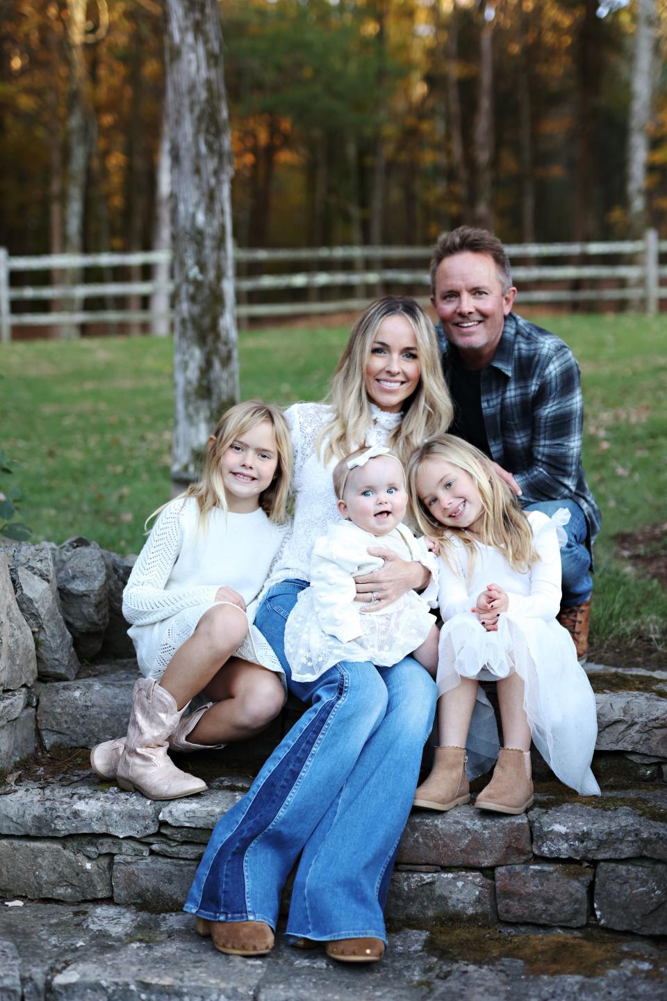 Chris Tomlin (right) and Lauren Tomlin (center) with daughters Ashlyn, Elle and Madison.