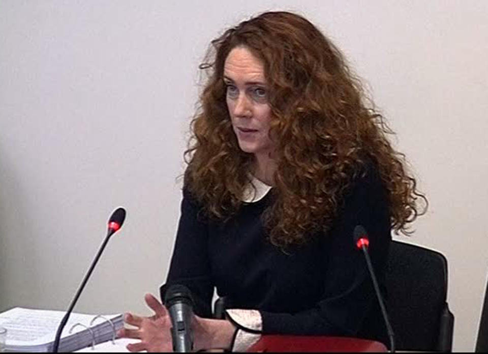 Former News of the World editor Rebekah Brooks gives evidence to Britain's media ethics inquiry in central London Friday May 11 2012 in this image from television. Brooks is a central figure in the scandal over tabloid phone hacking that has shaken both Rupert Murdoch's News Corp. and Britain's establishment. She resigned in July as chief executive of News International, Murdoch's British newspaper operation, and has twice been arrested and questioned by police about illegal eavesdropping and obstruction of justice. (AP Photo)