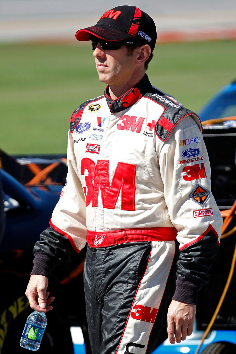 TALLADEGA, AL - OCTOBER 22: Greg Biffle, driver of the #16 3M/O'Reilly Auto Parts Ford, walks on pit road during qualifying for the NASCAR Sprint Cup Series Good Sam Club 500 at Talladega Superspeedway on October 22, 2011 in Talladega, Alabama. (Photo by Geoff Burke/Getty Images for NASCAR)