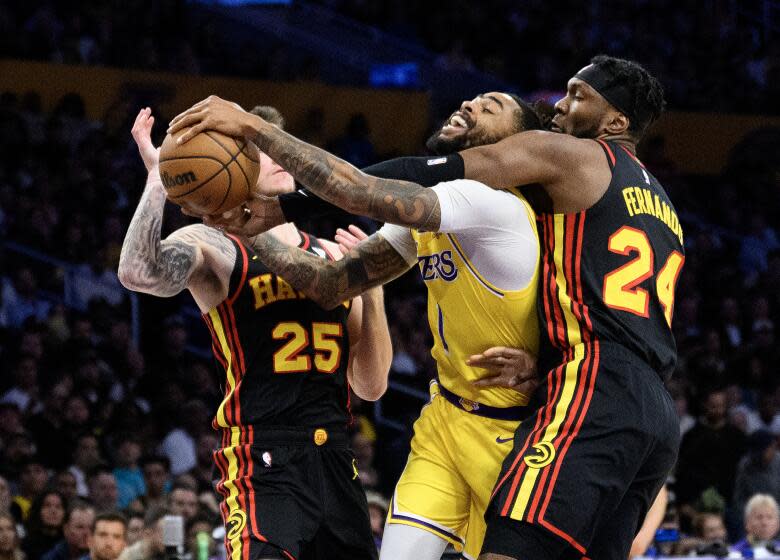 LOS ANGELES, CA - MARCH 18, 2024: Los Angeles Lakers guard D'Angelo Russell (1) is fouled.