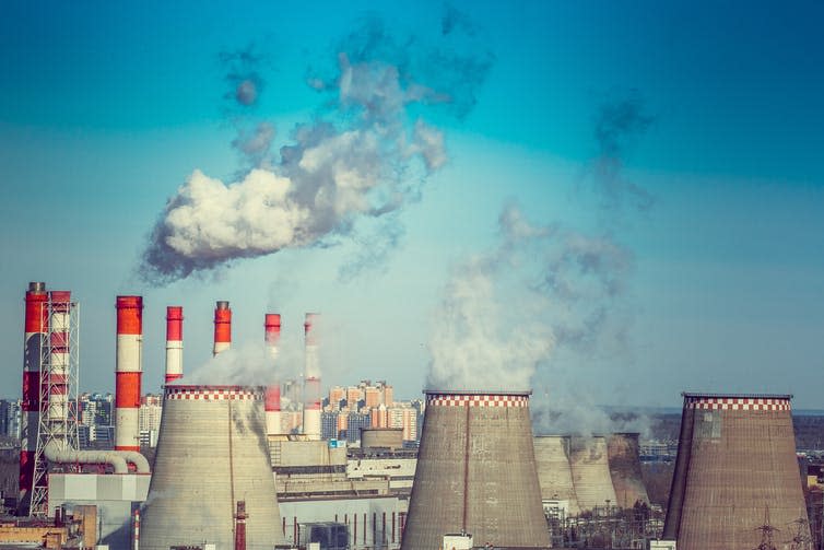 <span class="caption">A carbon tax would put a price on the carbon businesses emit, forcing them to take action.</span> <span class="attribution"><a class="link " href="https://www.shutterstock.com/image-photo/coal-fired-power-station-cooling-towers-392008096?src=rQBUJf_HU08ya2WzSqll_Q-1-0" rel="nofollow noopener" target="_blank" data-ylk="slk:ditttmer/Shutterstock;elm:context_link;itc:0;sec:content-canvas">ditttmer/Shutterstock</a></span>