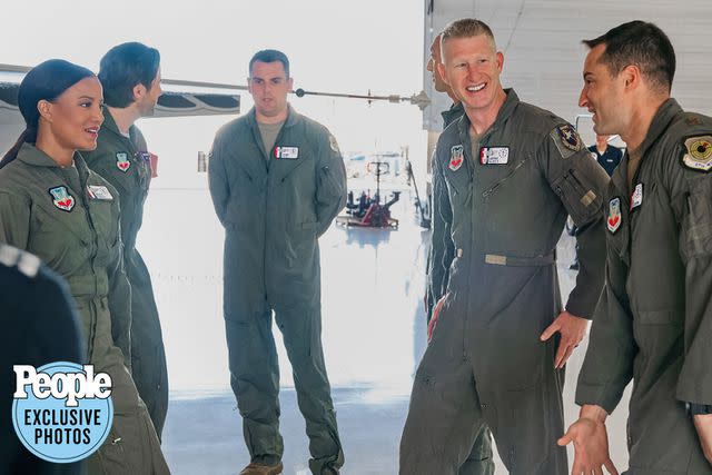 <p>2023 Hallmark Media/Kim Nunneley</p> Members of the Thunderbirds on the set of Hallmark's "Come Fly With Me"