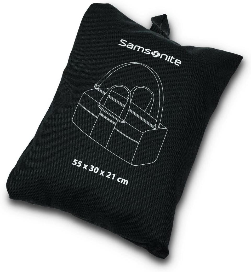 A black, foldable travel bag made from Amsonite that tucks into an attached pouch for easy storage