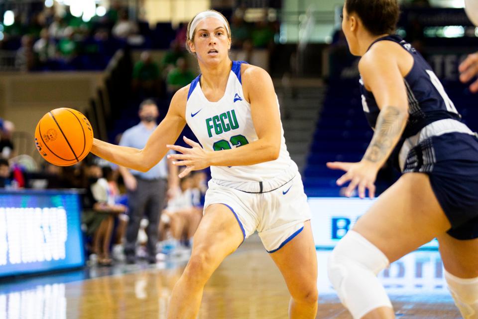 FGCU's Emma List (32) looks to pass the ball during the FGCU women's game against North Florida on Wednesday, Jan. 5, 2022 at FGCU's Alico Arena in Fort Myers, Fla. 