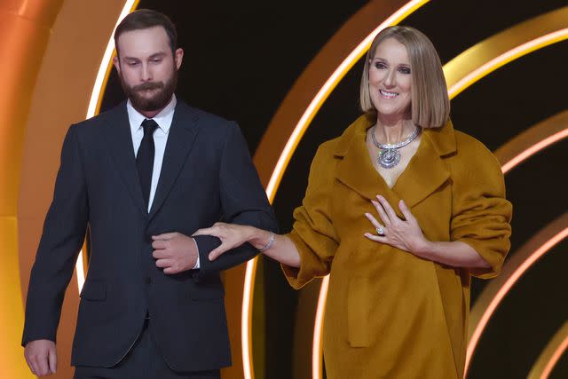 <p>Kevin Mazur/Getty</p> René-Charles Angélil and his mom Céline Dion at the Grammys in Los Angeles in February 2024