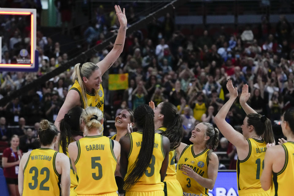 Australia's Lauren Jackson is held aloft by teammates as they celebrate after defeating Canada in their bronze medal game at the women's Basketball World Cup in Sydney, Australia, Saturday, Oct. 1, 2022. (AP Photo/Mark Baker)