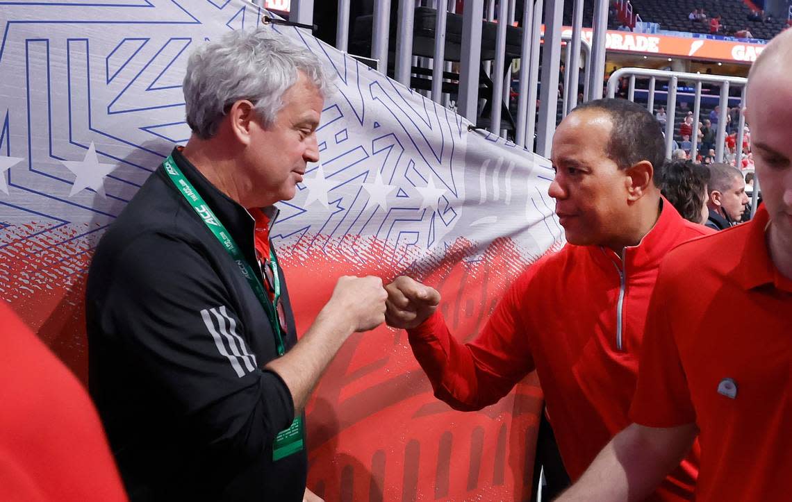N.C. State athletics director Boo Corrigan congratulates head coach Kevin Keatts after the Wolfpack’s 94-85 victory over Louisville in the first round of the 2024 ACC Men’s Basketball Tournament at Capital One Arena in Washington, D.C., Tuesday, March 12, 2024.