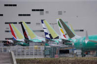 The tails of Boeing 737 MAX aircraft are seen at a Boeing production facility in Renton, Washington, U.S., March 11, 2019. REUTERS/David Ryder