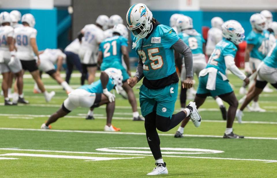 Miami Dolphins cornerback Xavien Howard (25) stretches during team practice at the Baptist Health Training Complex on Tuesday, June 6, 2023, in Miami Gardens, Fla.