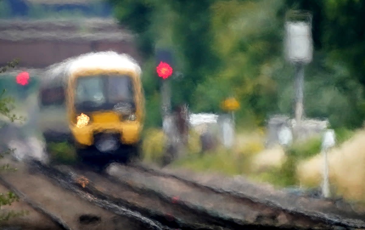 Speed restrictions imposed on trains amid fears of rails buckling in the heat could more than double journey times for passengers, the chief spokesman for Network Rail has said (Gareth Fuller/PA) (PA Wire)