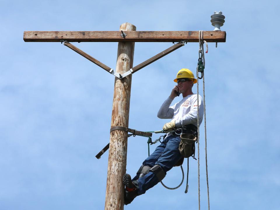 Gainesville Regional Utilities line workers give a demonstration during the annual employee appreciation rally put on by the city of Gainesville on April 13.