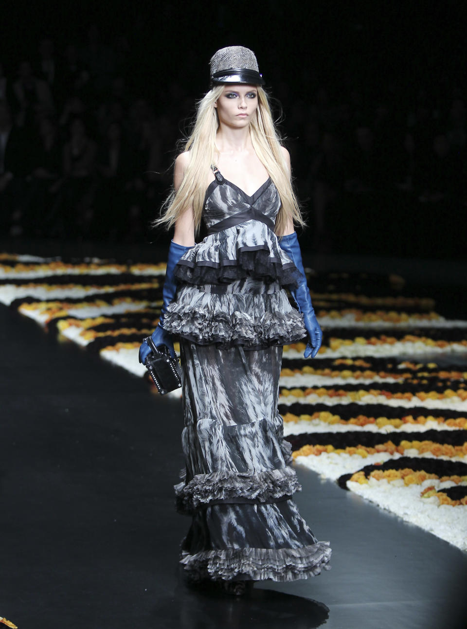 A model wears a creation part of the Roberto Cavalli women's Fall-Winter 2012-13 fashion collection, during the fashion week in Milan, Italy, Monday, Feb. 27, 2012. (AP Photo/Antonio Calanni)