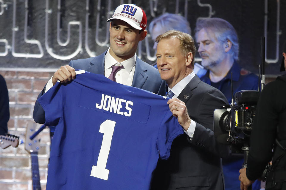 NASHVILLE, TENNESSEE - APRIL 25:  Quarterback Daniel Jones poses with NFL Commissioner Roger Goodell after being drafted sixth overall by the New York Giants on day 1 of the 2019 NFL Draft on April 25, 2019 in Nashville, Tennessee. (Photo by Frederick Breedon/Getty Images)