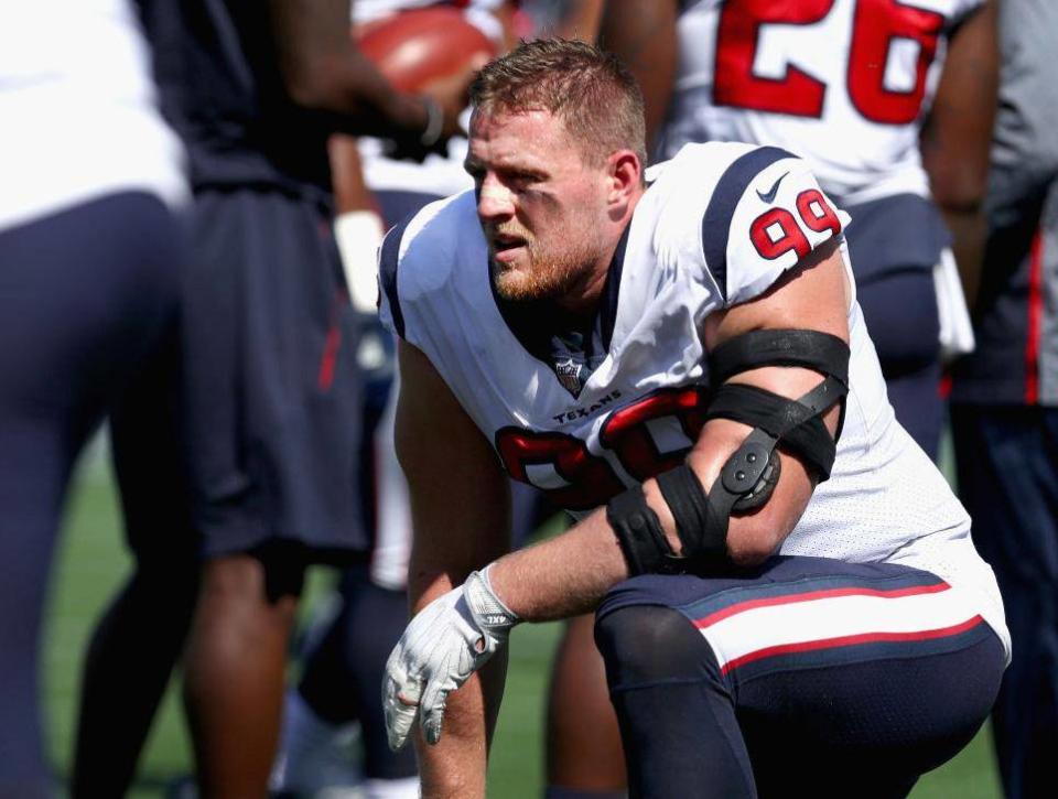 JJ Watt kneels before a game against the New England Patriots (Getty Images)