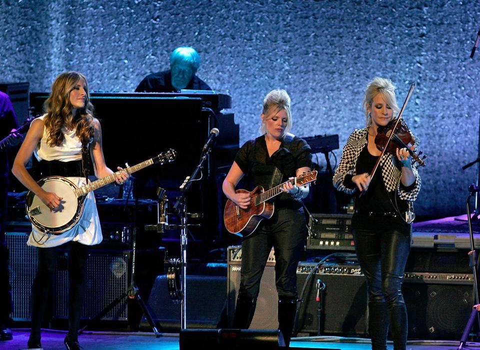 <p>They weren't even in attendance at the 2003 awards, but the Dixie Chicks' presence was definitely felt. Lead singer Natalie Maines had recently <a href="http://www.cnn.com/2003/SHOWBIZ/Music/03/14/dixie.chicks.reut/" rel="nofollow noopener" target="_blank" data-ylk="slk:told a concert crowd;elm:context_link;itc:0;sec:content-canvas" class="link ">told a concert crowd</a> she was embarrassed that President George W. Bush was also from the state of Texas. Although she later apologized for her remarks, the damage had been done: The <a href="http://people.com/celebrity/dixie-chicks-booed-at-country-awards/" rel="nofollow noopener" target="_blank" data-ylk="slk:ACM Awards crowd booed;elm:context_link;itc:0;sec:content-canvas" class="link ">ACM Awards crowd booed</a> the Dixie Chicks every time their name was mentioned, and the group didn't win a single award that night.</p>