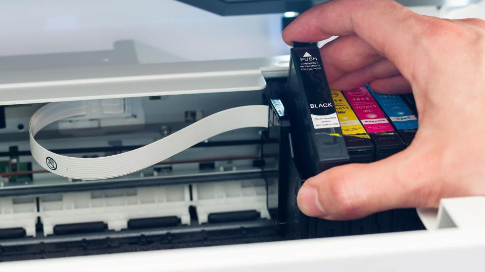 Third party printer cartridge in the hand.
