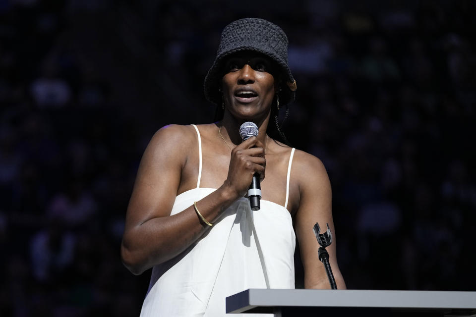 Former Minnesota Lynx player Sylvia Fowles speaks after her jersey number was retired following a WNBA basketball game between the Minnesota Lynx and the Los Angeles Sparks, Sunday, June 11, 2023, in Minneapolis. (AP Photo/Abbie Parr)