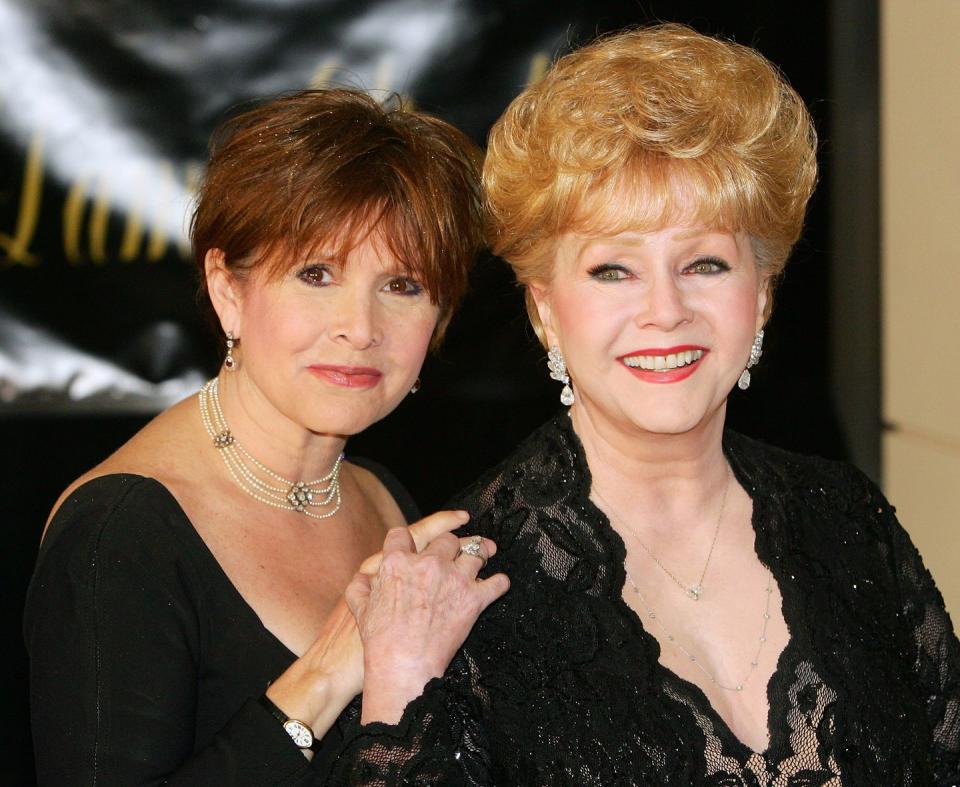 <p>Debbie Reynolds was a legend in Hollywood thanks to roles in <em>Singin' in the Rain </em>and other big studio films. Debbie had a daughter, Carrie, with singer Eddie Fisher before their acrimonious divorce where Fisher left Reynolds for her close friend, Elizabeth Taylor. Carrie Fisher was flung into stardom at an early age due but stepped into the spotlight on her own when she was cast as Princess Leia in the <em>Star Wars</em> franchise at 19. </p>