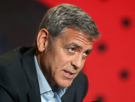 FILE PHOTO: Director George Clooney attends a news conference to promote the film "Suburbicon" at the Toronto International Film Festival (TIFF) in Toronto, Ontario, Canada, September 10, 2017. REUTERS/Fred Thornhill/File Photo