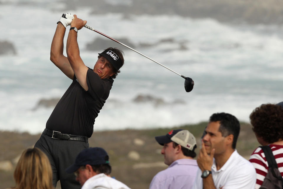 PEBBLE BEACH, CA - FEBRUARY 10: Phil Mickelson hits his tee shot on the 13th hole during the second round of the AT&T Pebble Beach National Pro-Am at the Monterey Peninsula Country Club (Shore Course) on February 10, 2012 in Pebble Beach, California. (Photo by Ezra Shaw/Getty Images)