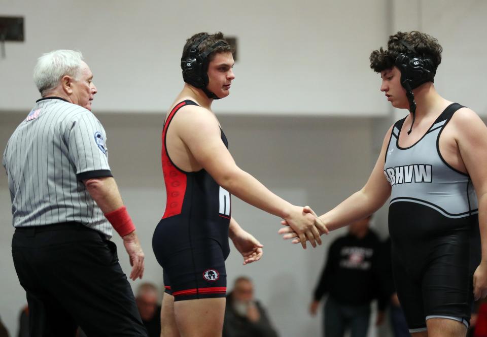 Byram Hills/Briarcliff/Valhalla/Westlake's Sabas Smith and Rye's Thomas Anderson wrestle in the 285-pound weight class during the dual meet quarterfinals at Byram Hills High School Dec. 19, 2023. Anderson won the match.