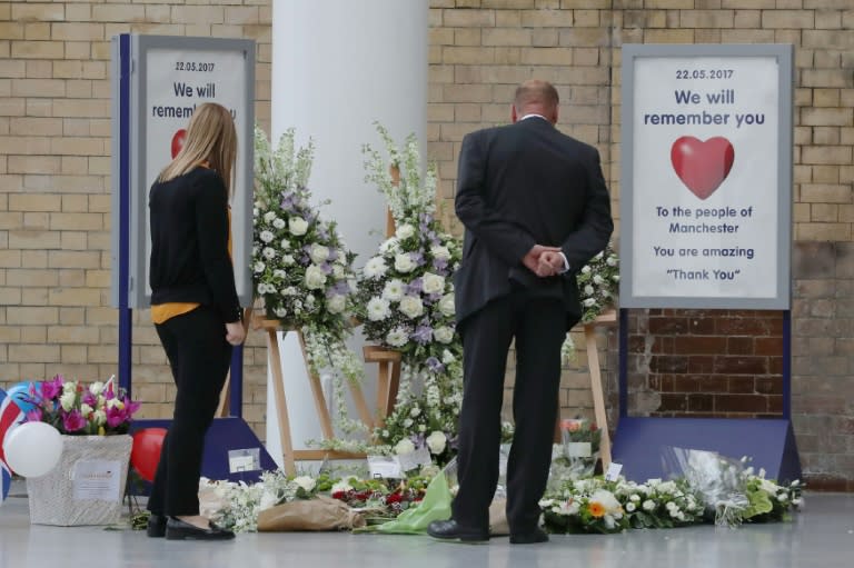 Floral tributes at the Manchester Victoria railway station on Tuesday as services resumed a week after the suicide bombing at a pop concert that killed 22 people