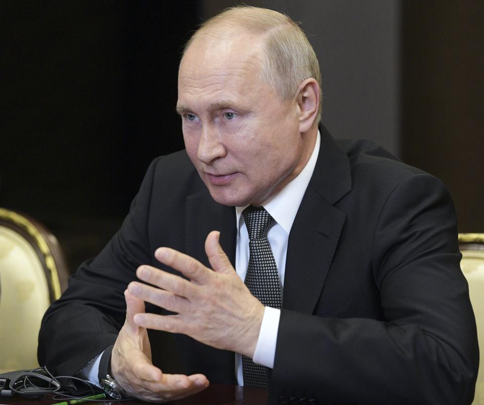 Russian President Vladimir Putin gestures while speaking to U.S. Secretary of State Mike Pompeo during their talks in the Black Sea resort city of Sochi, southern Russia, Tuesday, May 14, 2019. Pompeo arrived in Russia for talks that are expected to focus on an array of issues including arms control and Iran. ((Alexei Druzhinin, Sputnik, Kremlin Pool Photo via AP)