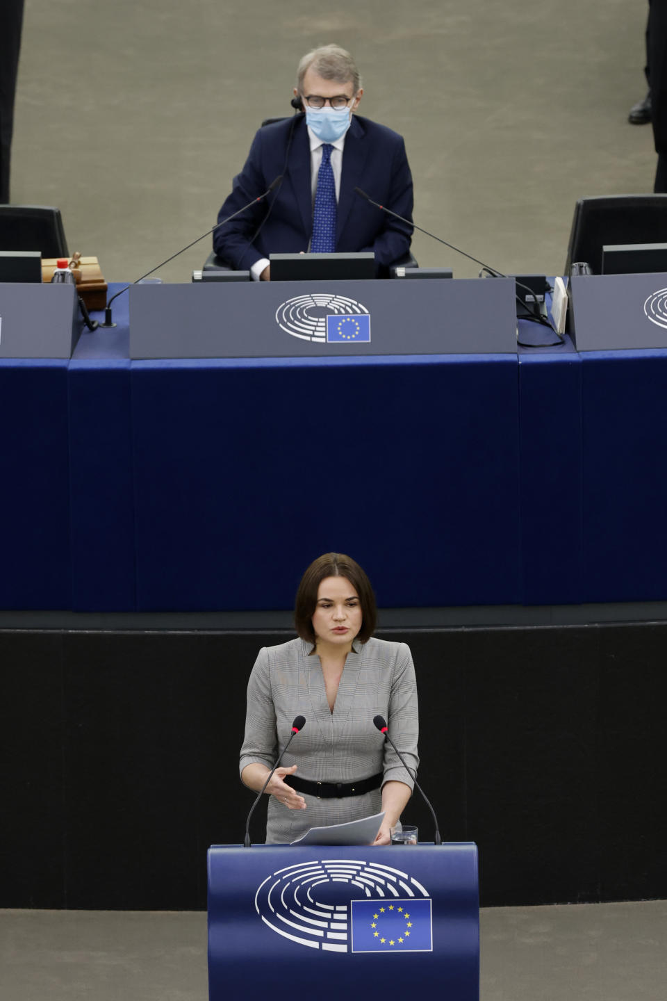 Belarusian opposition leader Sviatlana Tsikhanouskaya addresses the European Parliament as European Parliament President David Sassoli in Strasbourg, eastern France, Wednesday, Nov.24, 2021. (AP Photo/Jean-Francois Badias)