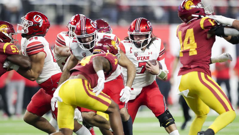 Utah quarterback Cam Rising looks for an opening during Pac-12 championship game against USC in at the Allegiant Stadium in Las Vegas on Friday, Dec. 2, 2022. Rising is recovering from an injury but is still providing leadership and assistance during spring camp.