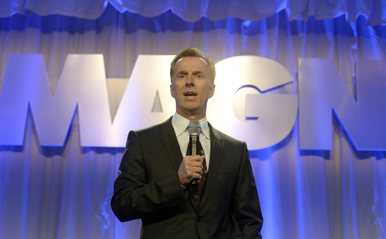 Magna CEO Don Walker speaks during the company's Annual Shareholder Meeting in Toronto, May 8, 2014. REUTERS/Aaron Harris  (CANADA - Tags: BUSINESS TRANSPORT)