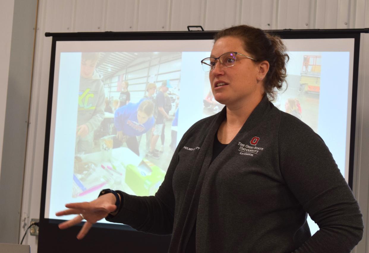 Agriculture and Natural Resources Educator Janessa Hill spoke about programming events going on through OSU Extension at the spring meeting at Harvest Ridge.