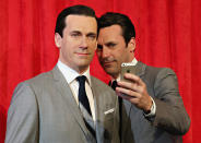 The actor and his wax statue of <i>Mad Men's</i> Don Draper (at Madame Tussauds New York, unveiled in May 2014 for the show's final season) are like night and day. Draper is suave, Hamm is silly (or at least, he thinks his sex symbol status is). Draper uses an 8mm, Hamm prefers selfies. Somehow they still get along just fine.