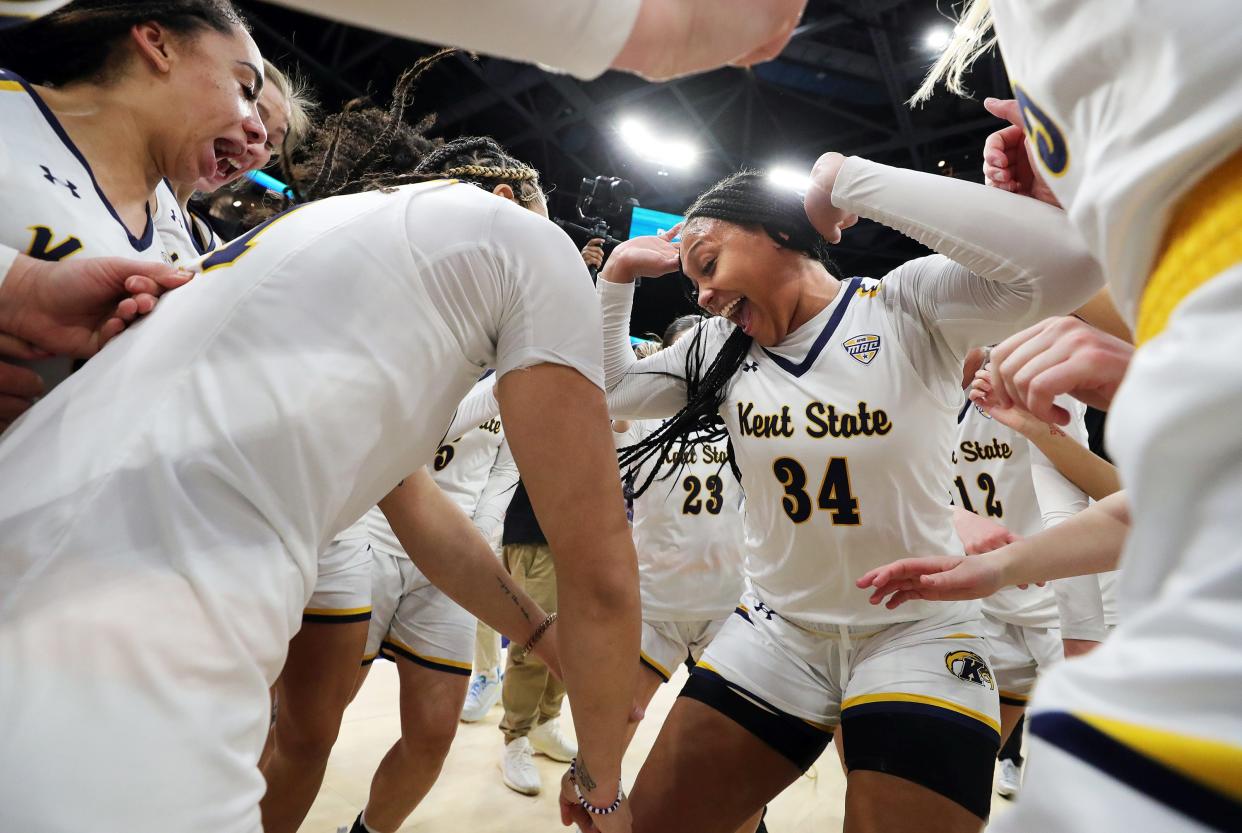 Kent State forward Janae Tyler (34) dances with her teammates after beating Buffalo to win the Mid-American Conference Women's Basketball Tournament championship on Saturday.