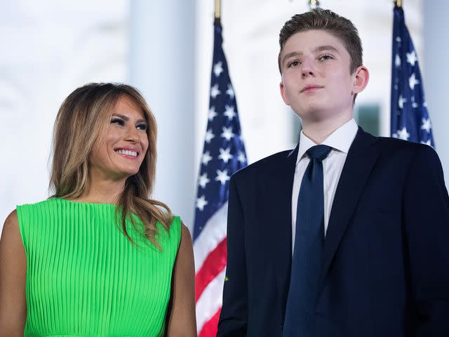 <p>Chip Somodevilla/Getty</p> Melania and Barron Trump stand together as former President Donald Trump accepts the Republican presidential nomination in 2020