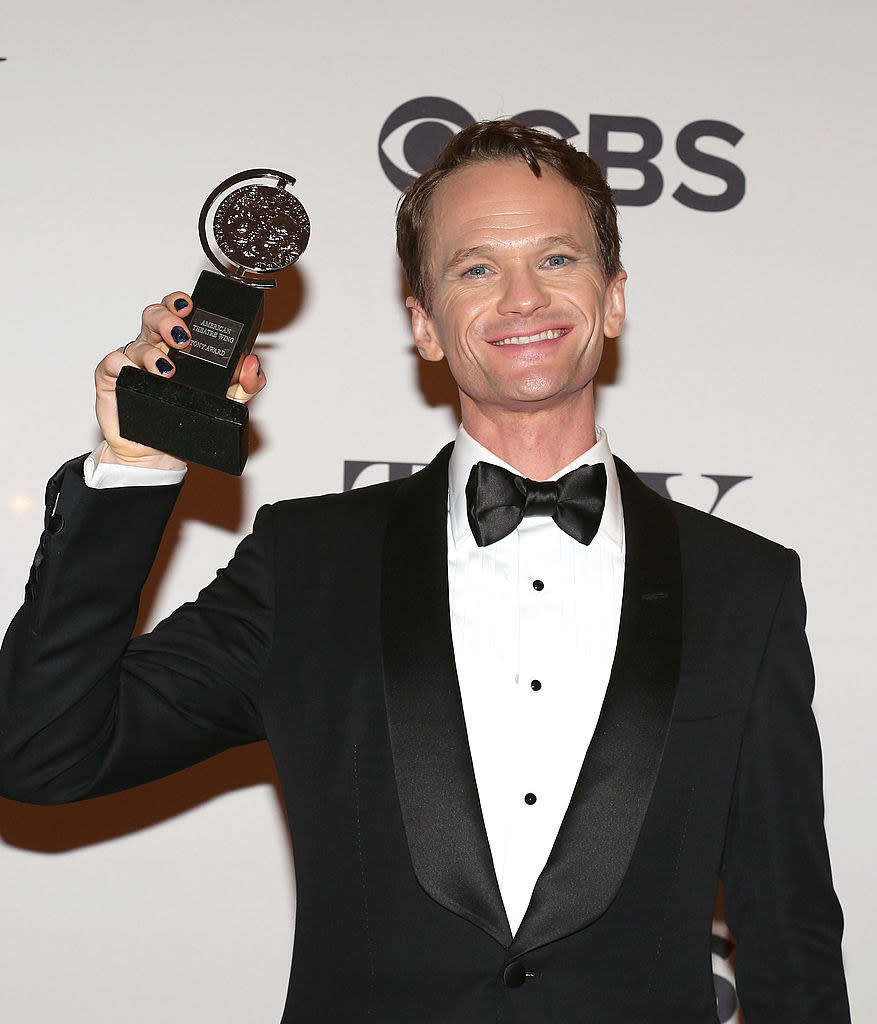 Neil Patrick Harris holding a Tony