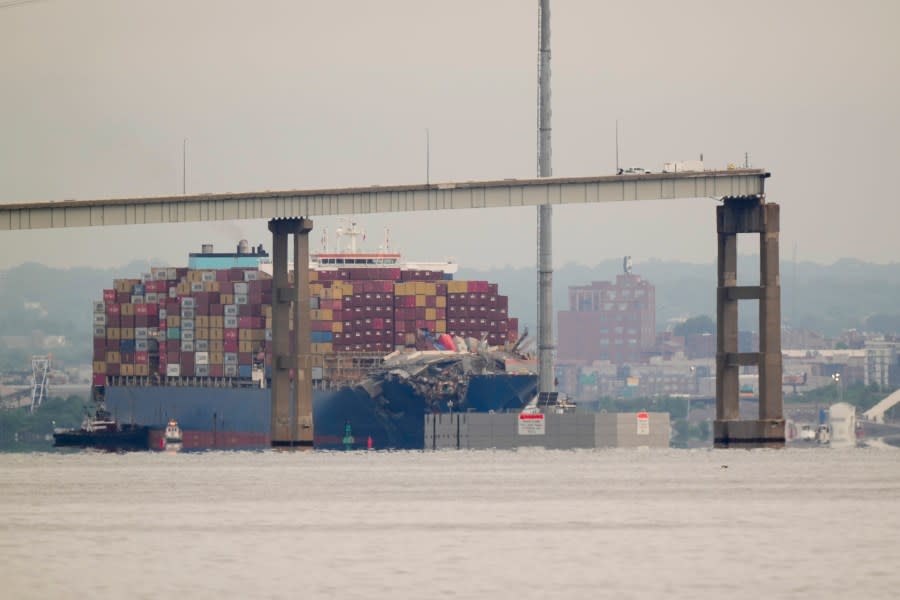 Tugboats escort the cargo ship Dali after it was refloated in Baltimore, Monday, May 20, 2024. The container ship that caused the deadly collapse of Baltimore’s Francis Scott Key Bridge was refloated Monday and has begun slowly moving back to port. (AP Photo/Matt Rourke)