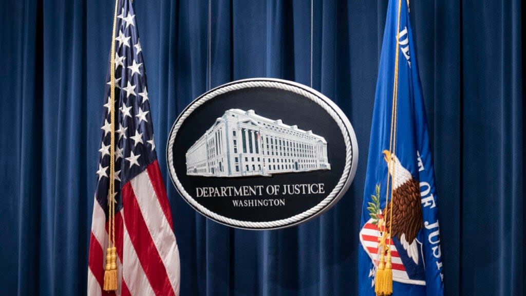 A sign for the Department of Justice as seen on January 12, 2021 in Washington, DC. (Photo by Sarah Silbiger-Pool/Getty Images)