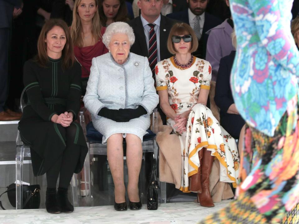 Queen Elizabeth II at Richard Quinn’s London Fashion Week show in 2018 (Yui Mok/PA) (PA Archive)
