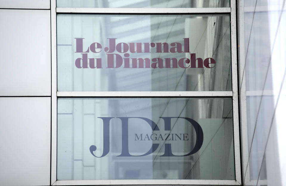 A poster advertising for the Journal du Dimanche, know as JDD , is seen outside the Lagardere News headquarters Tuesday, Aug. 1, 2023 in Paris. The journalists of French emblematic Sunday newspaper Le Journal du Dimanche have decided to put an end to a 40-day strike as they unsuccessfully protested against the appointment of a new editor-in-chief, Geoffroy Lejeune, they denounce as an outspoken far-right supporter. (AP Photo/Christophe Ena)