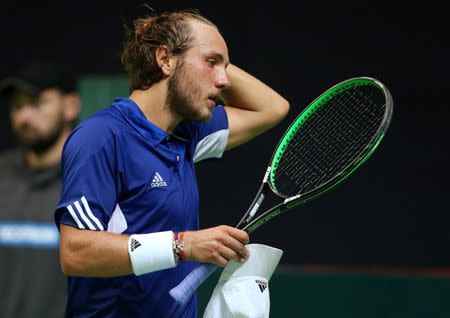 Tennis - Croatia v France - Davis Cup Semi Final - Kresimir Cosic Hall, Zadar, Croatia - 16/9/16 France's Lucas Pouille react during his singles match against Croatia's Marin Cilic. REUTERS/Antonio Bronic